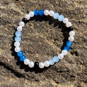 Blue and White Beaded Stretch Bracelet with Black Accents